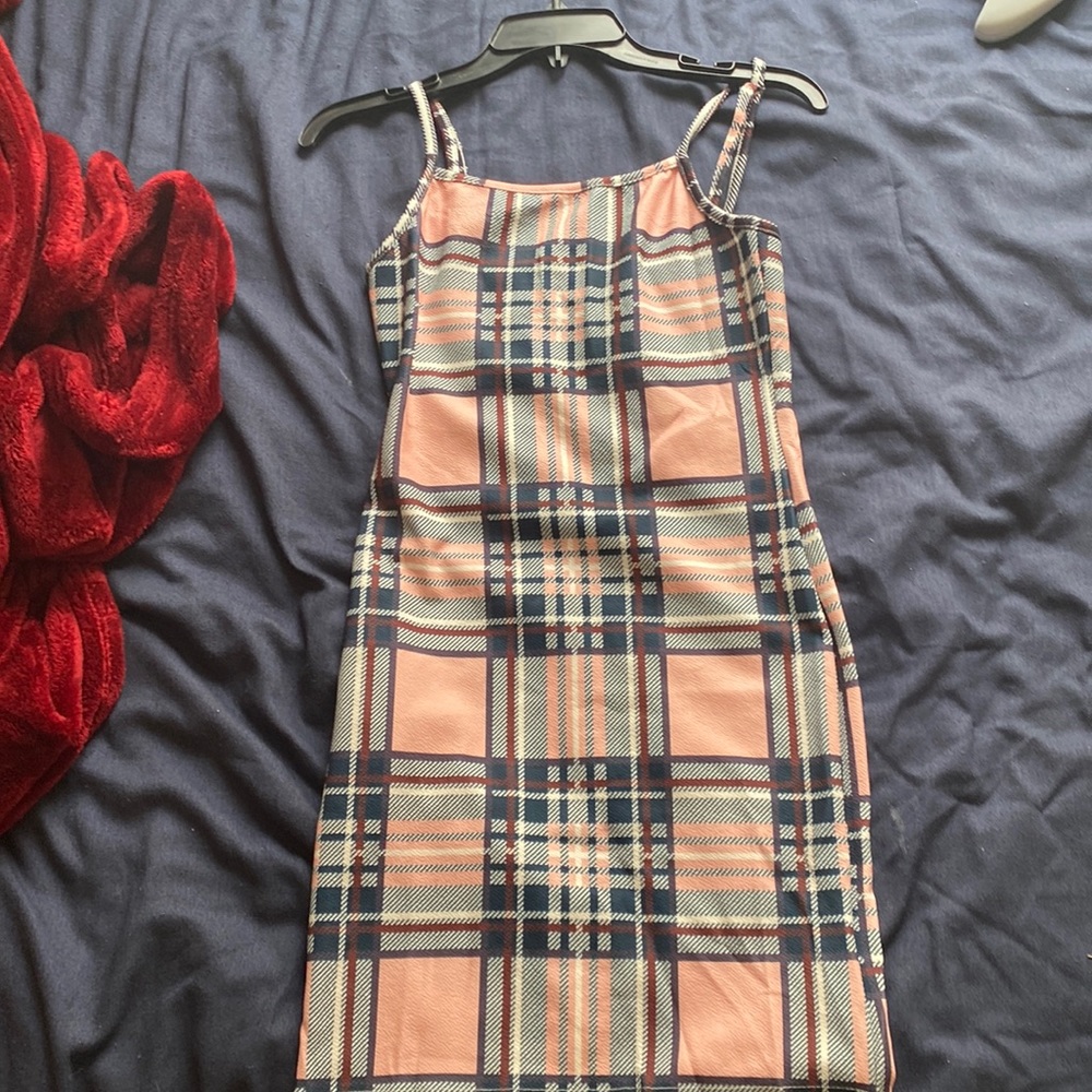 sleeveless square neck dress it is a Mini dress depending on your height